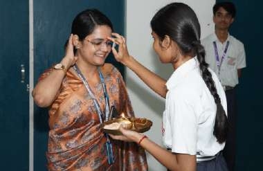 Sacred Tilak Ceremony: Honouring Dedicated Faculty