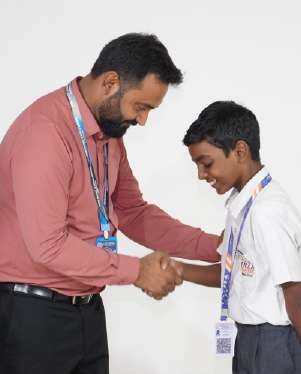 Teacher Greeting Boy Prefect