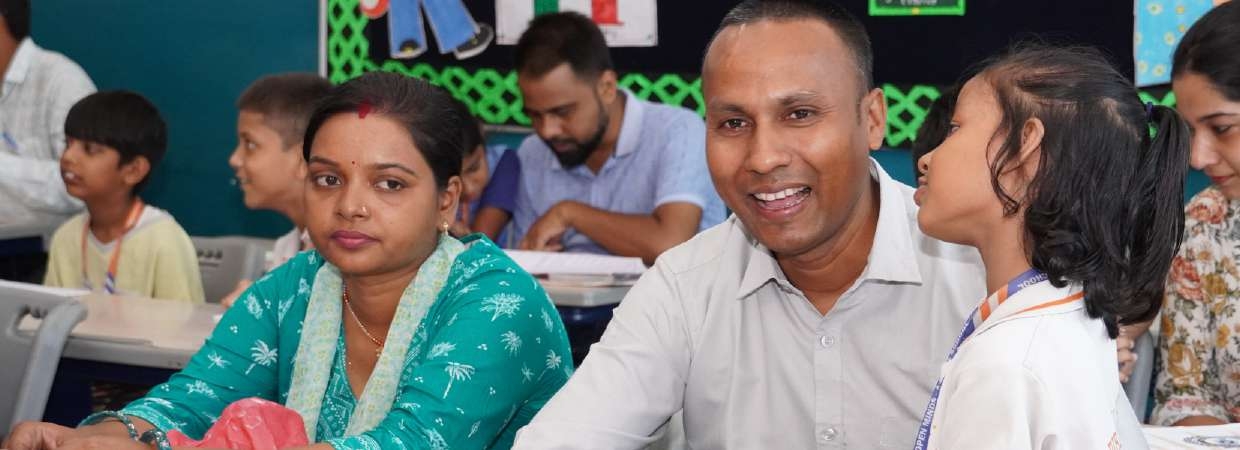 Delighted father with his daughter sharing smiles after a fruitful consultation