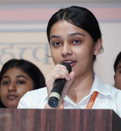 Student Speaker explaining philosophical maxims