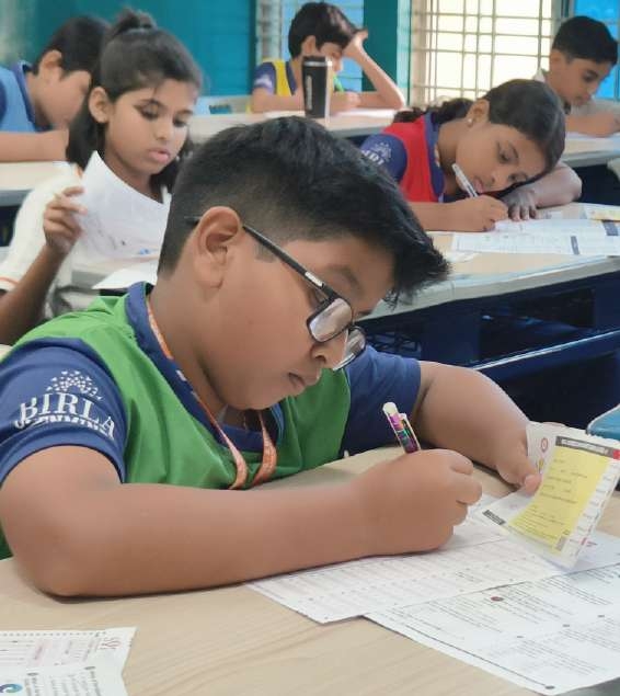 Student Methodically Filling OMR Answer Sheet