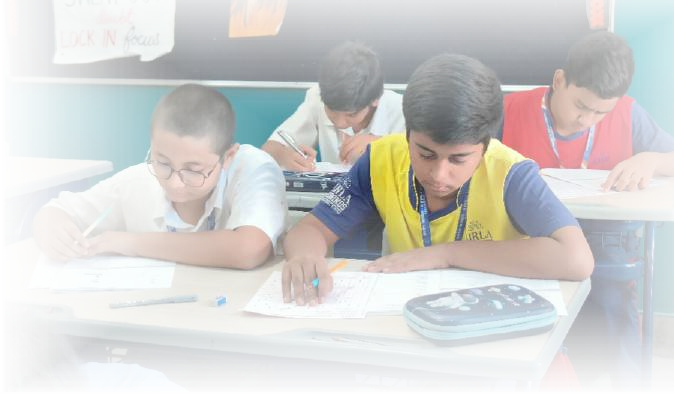 Students engaged in collaborative revision and practice