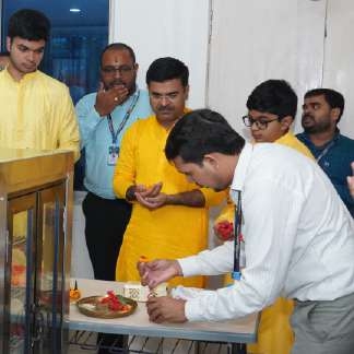 Principal and student in prayerful reverence