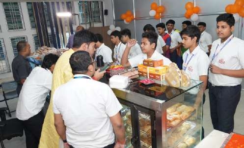 Students gathered around the confectionery counter