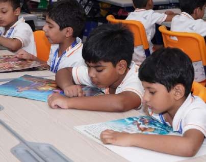 Young Boys Reading Side by Side
